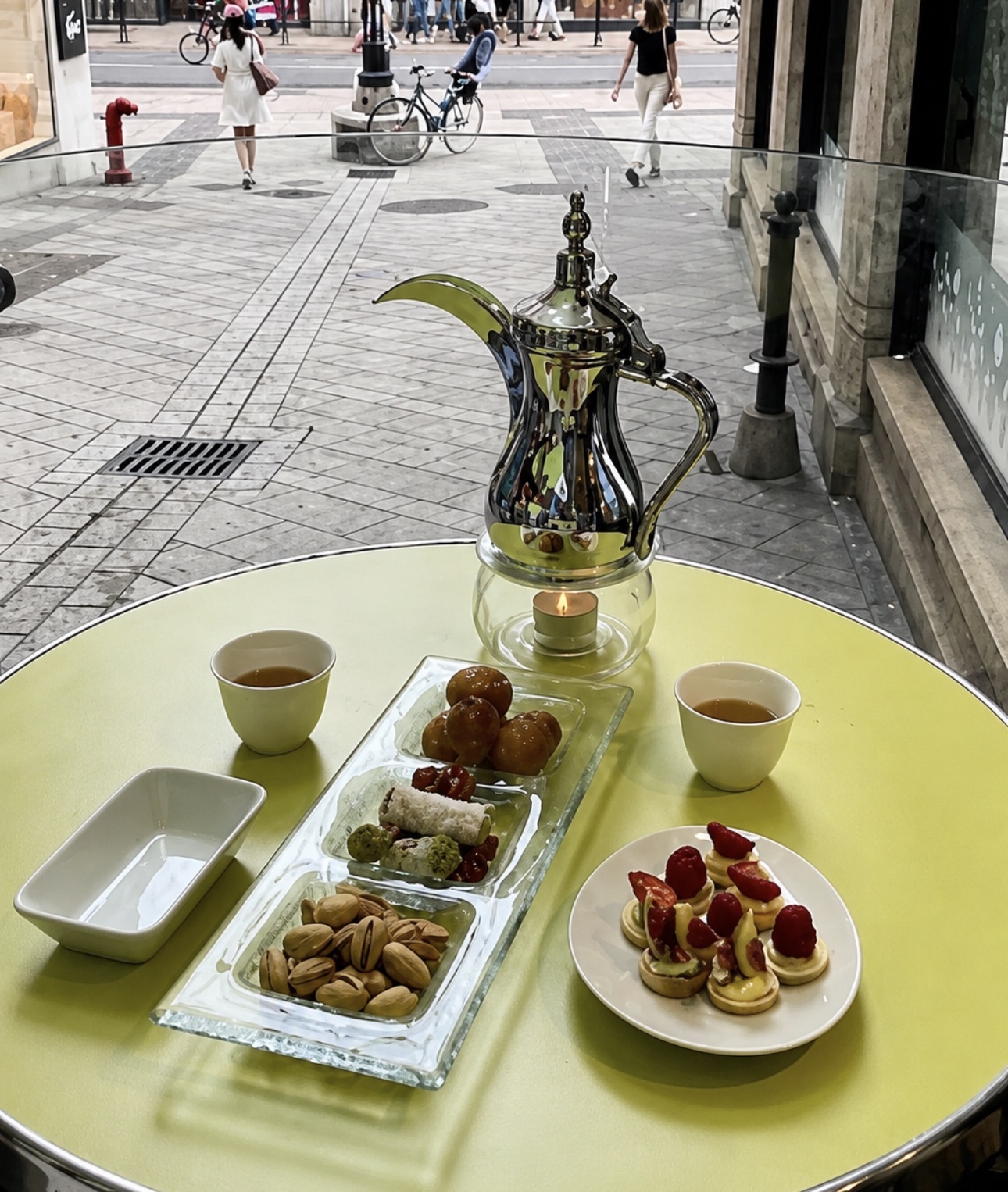 Dallah coffee pot with sweets on the terrace at La Bergamote